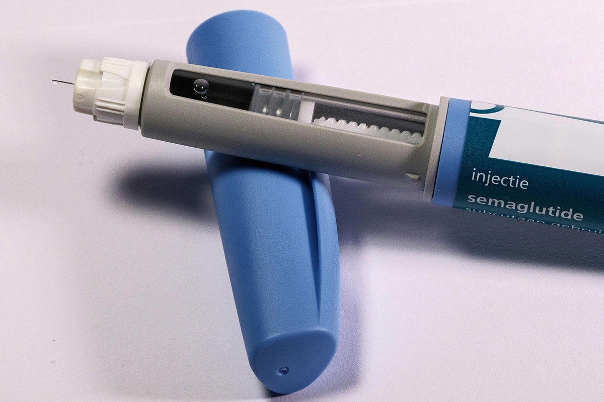 Affordable GLP-1 medications including injection pens and pills displayed with price tags, discount cards, and budgeting tools for uninsured patients seeking lower-cost weight loss and diabetes treatment.