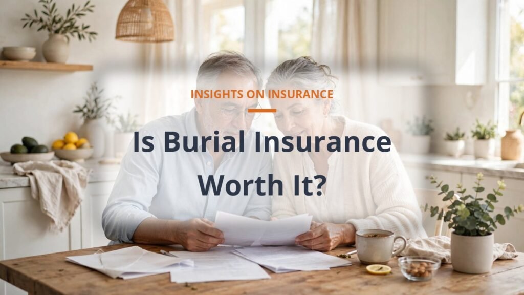 is burial insurance worth it, senior couple reviewing a policy at a bright kitchen table