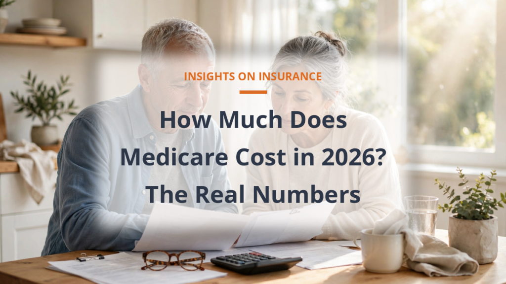 Senior couple reviewing Medicare costs and paperwork at a bright kitchen table