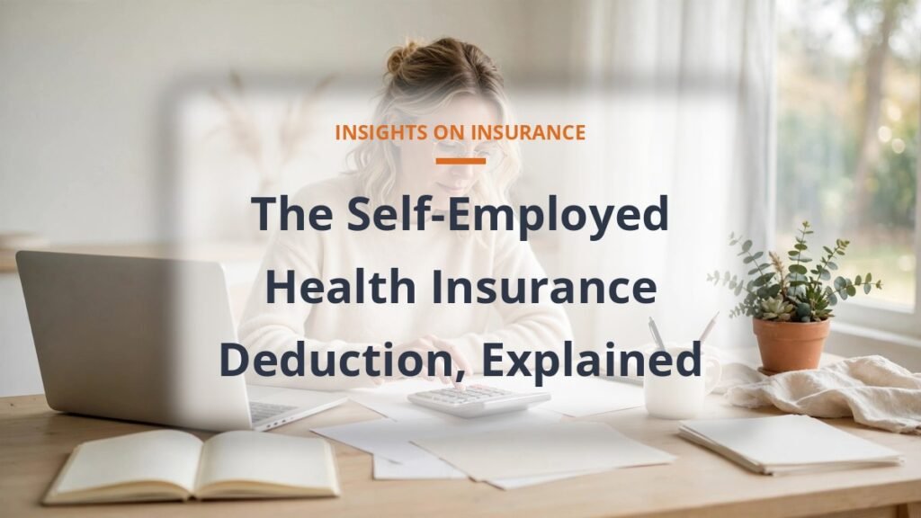 Freelancer doing tax paperwork at a home desk, self-employed health insurance deduction explained